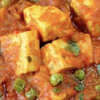 Matar Paneer · cube-shaped homemade cheese cooked with, onions, peas, herbs and spices
