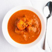 Chicken Tikka Masala · Marinated boneless white meat cooked in a light batter Bombay Indian Cuisine favorite: