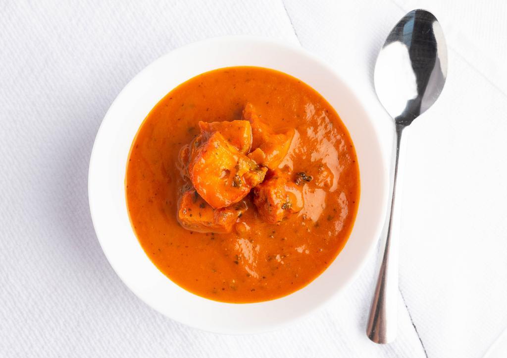 Chicken Tikka Masala · Marinated boneless white meat cooked in a light batter Bombay Indian Cuisine favorite: