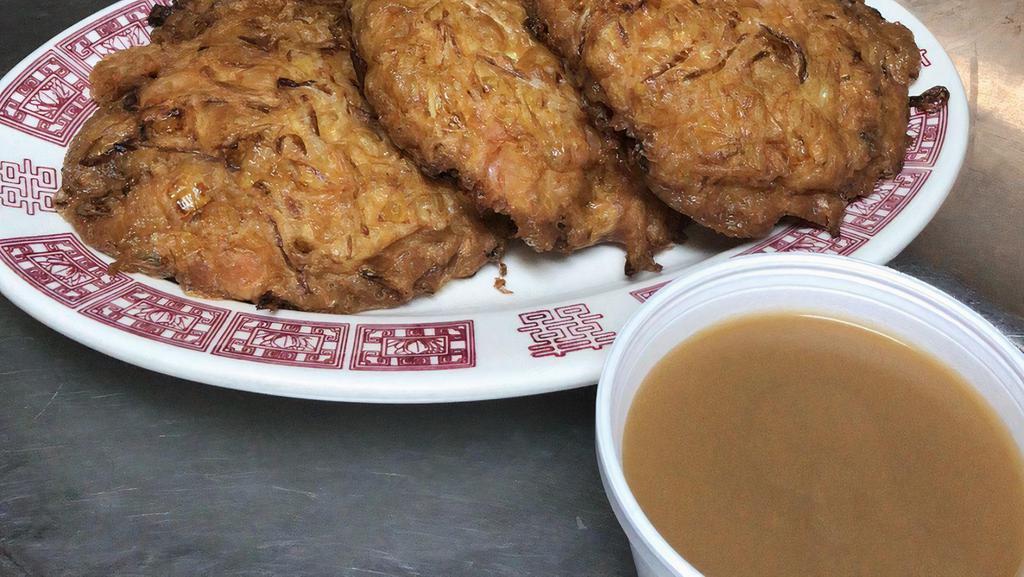 Roast Pork Egg Foo Young · Comes with egg roll and pork rice. hot and sour soup or chicken rice soup for an additional charge.