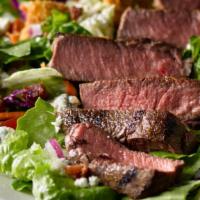 Steak Mozzarella Salad · Slice steak, mixed greens, romaine, tomato, cucumbers, and balsamic dressing.