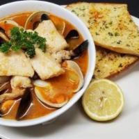 Seafood Soup · Red seafood soup, shrimp, Fish, clams, mussels and calamari.