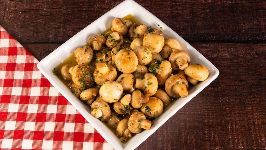 Sautéed Garlic Mushrooms · Sautéed mushrooms with garlic, tyme, parsley, butter, Flambéed with white wine.