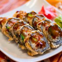 Ichi Roll · Batter-fried roll with eel, one crab, avocado, cream cheese, and topped with teriyaki sauce.