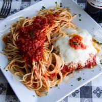 Chicken Parmigiana · Chicken breast lightly breaded and topped with plenty of our homemade tomato sauce and Mozza...