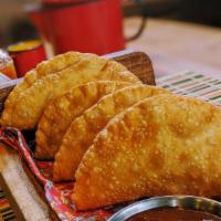 Beef Empanada (Pastel De Carne) (2Pcs) · This delicious Brazilian beef empanada is made with light pastry dough and filled with groun...
