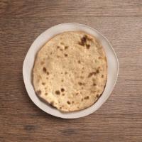 Plain Roti · Whole wheat unleavened bread cooked in the tandoor.