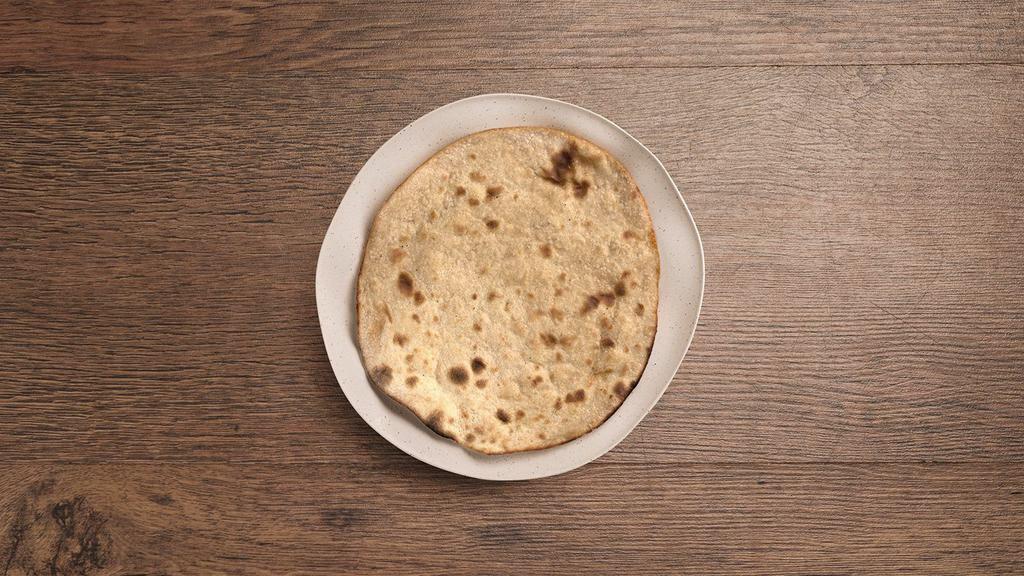 Plain Roti · Whole wheat unleavened bread cooked in the tandoor.