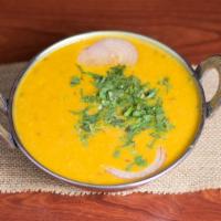 Yellow Daal · Yellow lentils made with Indian spices.