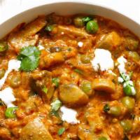 Mushroom Masala · Mushroom and peas cooked in a tomato and onion gravy.