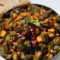 Bhindi Masala · Fresh cut okra cooked with diced onions and tomatoes in a garlic & ginger paste (dry dish).