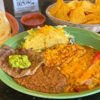 Big Dave'S Enchilada Special · Two cheese enchiladas, one soft or crispy taco with beef or chicken and a strip of carne asa...