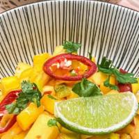 Mango Bowl · Seasoned mango bites, cilantro, lime juice, chilies