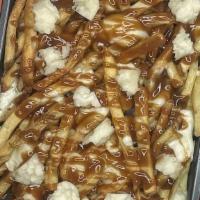 Poutine My Mouth · thick, creamy gravy over crispy fries covered with cheese curds, a love story from our neigh...
