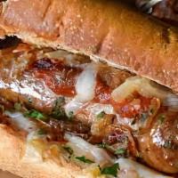 Italian Sausage Sub · Mild Sausage, Onions, Sweet peppers, Pizza Sauce, Provolone