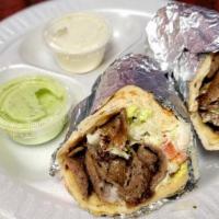 Gyro Kabob Sandwich · Combination of beef and lamb, spiced and served on grilled pita with onions and tomatoes wit...