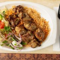 Lamb Kabob · Large pieces of tender lamb, marinated in special spices and garlic skewered and broiled ove...