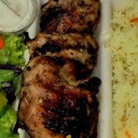 Thigh Platter · Marinated boneless, skinless grilled chicken thighs, House rice (chicken bouillon, carrot, s...