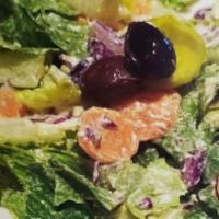 House Salad · Romaine, iceberg, red cabbage, mild banana rings, black olives, carrots, and house-made crea...