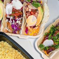 8 Tacos · 8 tacos of your choice, House rice, and House salad.