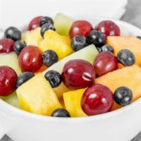Fruit Salad · A colorful assortment of cut melons, pineapples and grapes.
