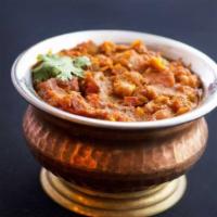 Chana Masala · Chickpeas with fresh onion, tomato and ginger.