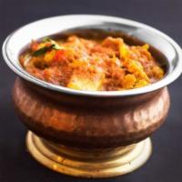 Aloo Gobhi · Cauliflower, potato and tomato stewed with cumin and coriander.