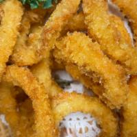 Fried Calamari · Lightly fried marinated squid w. special sauce.