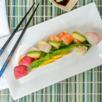 Rainbow Roll · Tuna, white fish ,salmon, avocado on the top of California roll