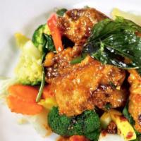 Crispy Chicken Basil  · Spicy. Slightly fried golden chicken glaze over high heat wok with spicy basil sauce. Served...