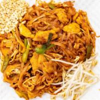 Pad Thai · Rice noodles sauteed with house tamarind sauce, eggs, scallion and bean sprouts topped peanu...
