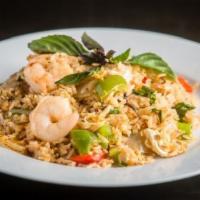 Spicy Fried Rice
 · Thai jasmine rice stir-fried with minced chili-garlic, egg, onion, red bell peppers and Thai...