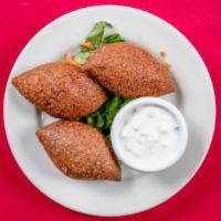 Meat Kibbeh Plate · Ground beef & bulgur, stuffed with ground beef & pine nuts. kibbeh chicken :