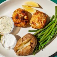 Double Crab Cake Dinner · Two 5-ounce cakes, broiled or fried, served with a baked potato and green beans.