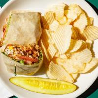 Blackened Chicken Wrap · Blackened chicken breast wrapped in a warm flour tortilla with rice pilaf, Jack and Cheddar ...