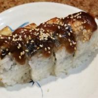 Dragon Roll (4Pc) · Spicy. Shrimp tempura, krab salad topped with unagi, avocado, unagi sauce and masago.