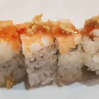 Ichi Roll (4Pc) · Spicy. Krab salad, cucumber, topped with ebi, peanuts, and sweet chili sauce.