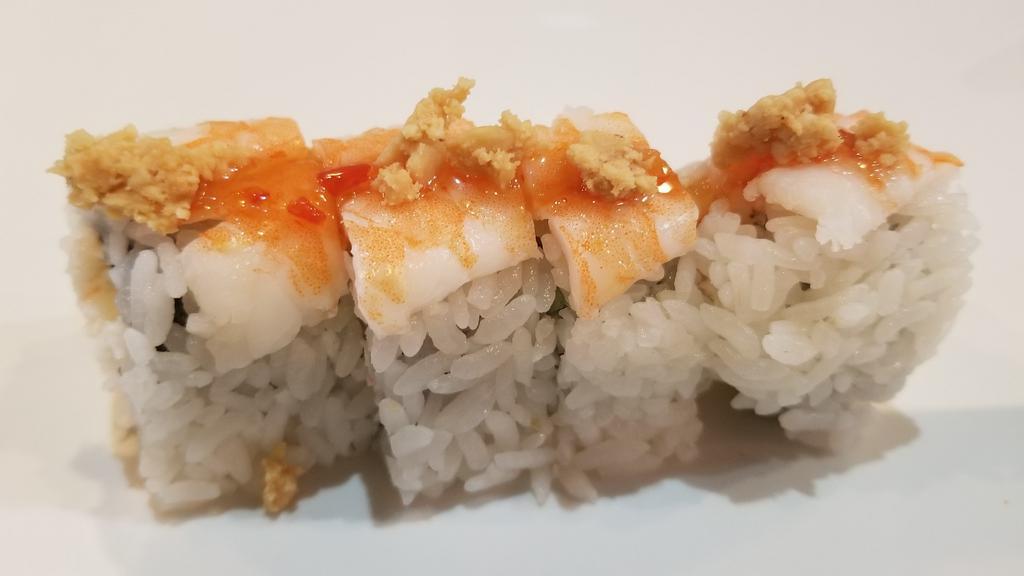 Ichi Roll (4Pc) · Spicy. Krab salad, cucumber, topped with ebi, peanuts, and sweet chili sauce.