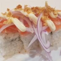 Tokyo Roll (4Pc) · Spicy. Krab salad, topped with fresh salmon, red onions, fried garlic flakes and mayo (raw).