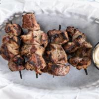 Dakota Chislic · Cubed lamb skewered, grilled and seasoned with a house blend, served with bam bam mustard.