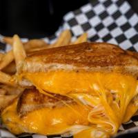 Ultimate Grilled Cheese · Cheddar, Swiss.