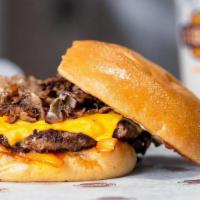 Philly Burger · 4 oz. Philly steak, sauteed onions, American cheese, ketchup, and mayonnaise on a fresh bake...