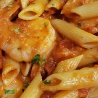 Shrimp Ricardo · Jumbo shrimp sautéed with fresh mushrooms in our creamy, spicy vodka sauce and tossed with p...