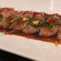 Yellowtail Jalapeno · Spicy. Sliced yellowtail w. jalapeno & ponzu sauce.

Some food items in this menu may contai...