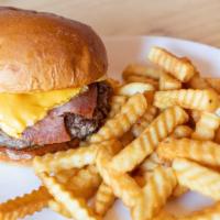 Broadway Breakfast Burger · Seven Ounce Proprietary Blend Beef, Taylor Ham, Fried Egg, American Cheese, “JB” Sauce.