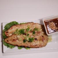 Chicken Satay / Gà Nướng Sa Tế (2 Pieces) · Slice of chicken breast, marinated, lemongrass in sate sauce and grilled, served with peanut...