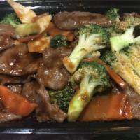 Beef Broccoli In Garlic Sauce · Served with white rice.