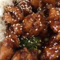 Sesame Chicken · Served with egg roll fried, and can soda all shrimp or seafood dish.