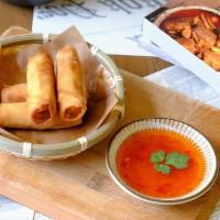 Crispy Vegetable Egg Roll · Crispy vegetable egg roll served with sweet chili sauce (4 pieces).