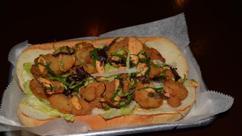 Fried Oyster Sub · Fried oyster, shredded lettuce, red cabbage and remoulade sauce. Add fries for an additional charge.